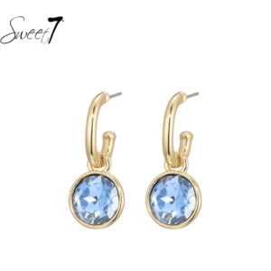 Sweet 7 - Oorbel rond met blauwe diamant